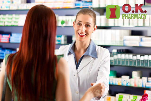 a female pharmacist talking to a female customer
